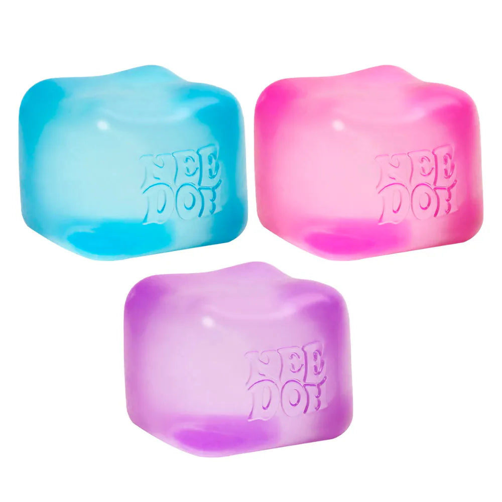 Three colorful nice cube-shaped squish Needoh toys with 'Nee Doh' branding on a white background.