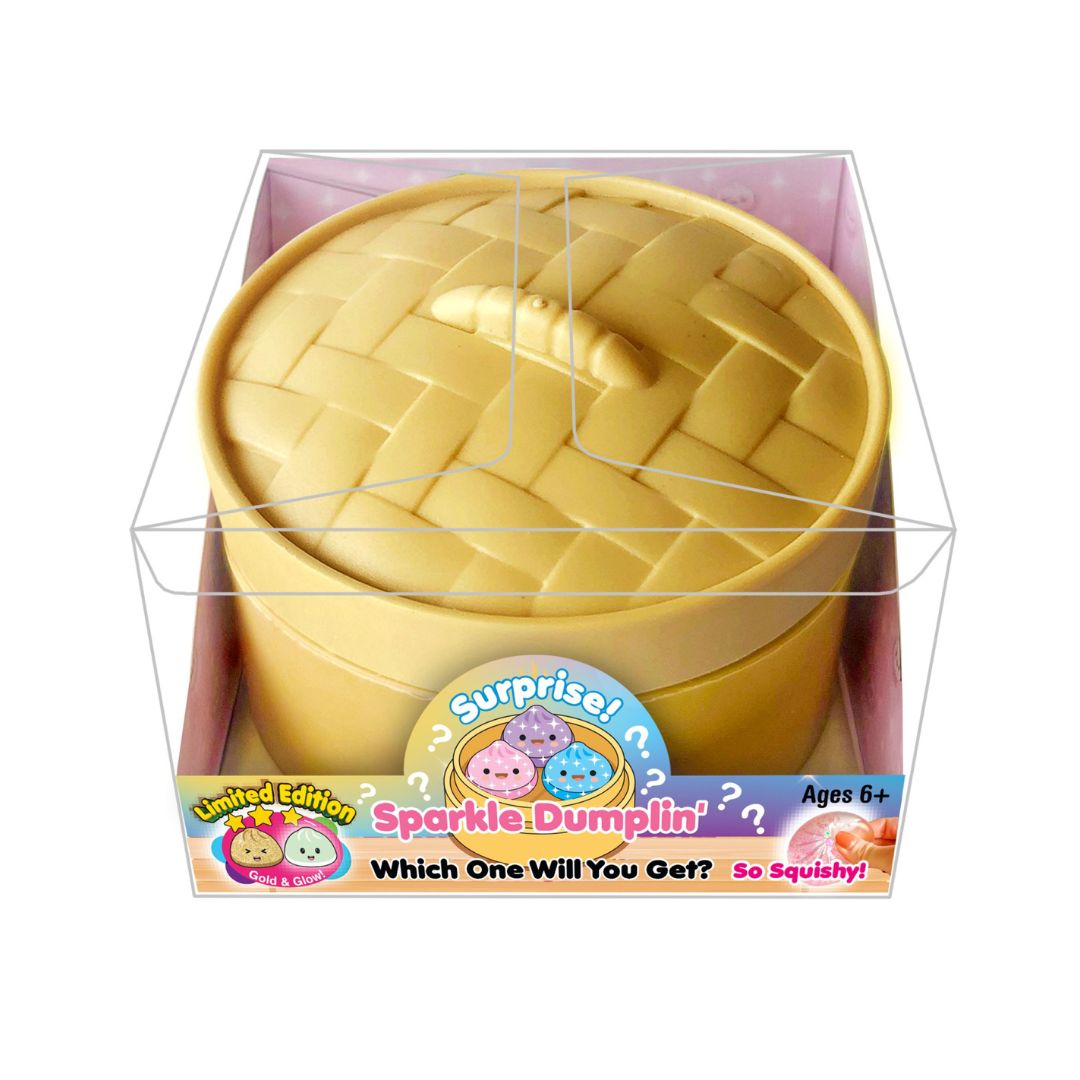 Tan Dumplin container inside a clear box with text "Surprise Sparkle Dumplin, which one will you get."