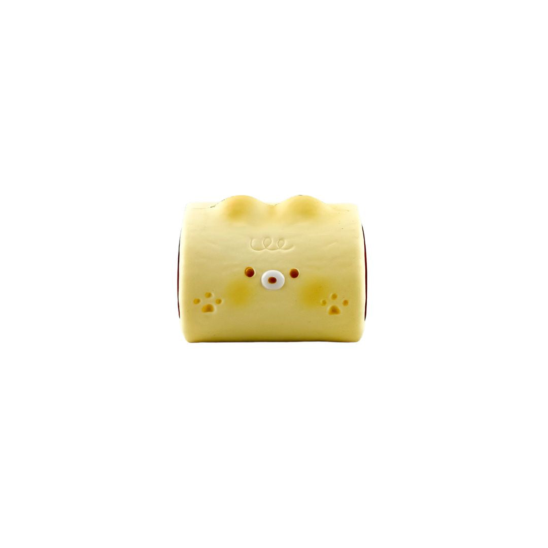 Yellow Donkey Rolls squishy toy shaped like a rolled character with a simple face on a white background.