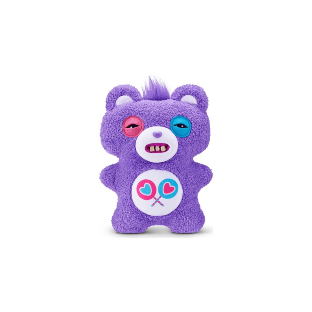 Purple Care Bears plush bag charm with a fuzzy textured body, a white belly emblem showing crossed heart shapes, mismatched pink and teal eyes, small white teeth, and a short purple tuft of hair on top, shown on a white background.