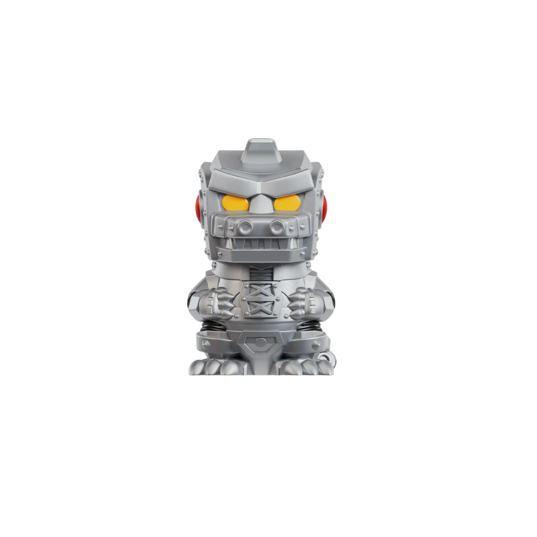 Silver robot‑style collectible figurine with yellow eyes standing upright on a white background.