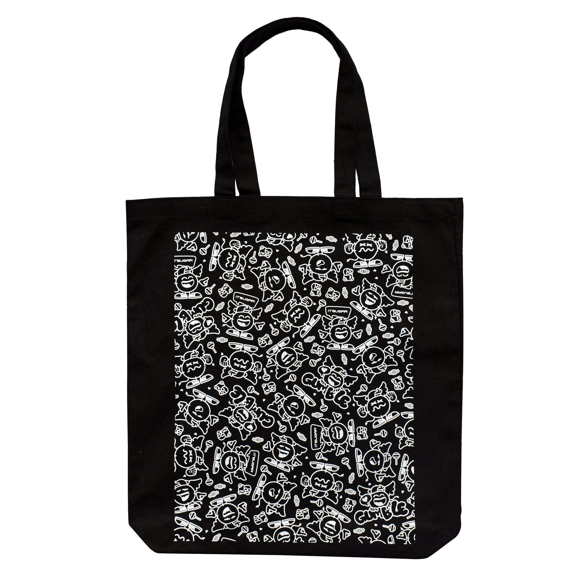Back view of a black canvas tote bag with two handles, featuring a large white all‑over doodle pattern of It’Sugar cartoon icons and candy graphics on the center panel.