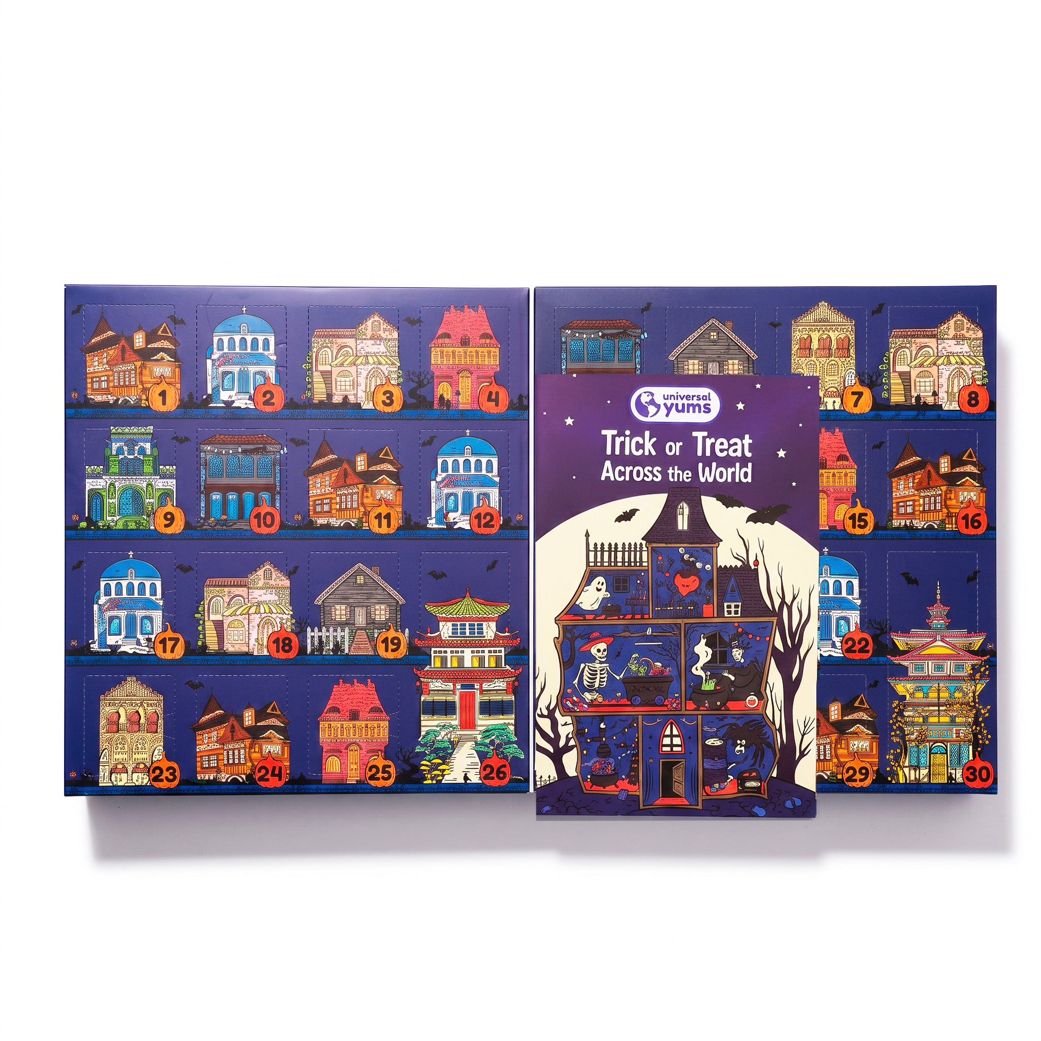 A Halloween-themed advent calendar set by Universal Yums, featuring a large 30-compartment cardboard box with illustrated haunted houses and numbered doors, alongside a smaller purple booklet titled 'Trick or Treat Across the World'.