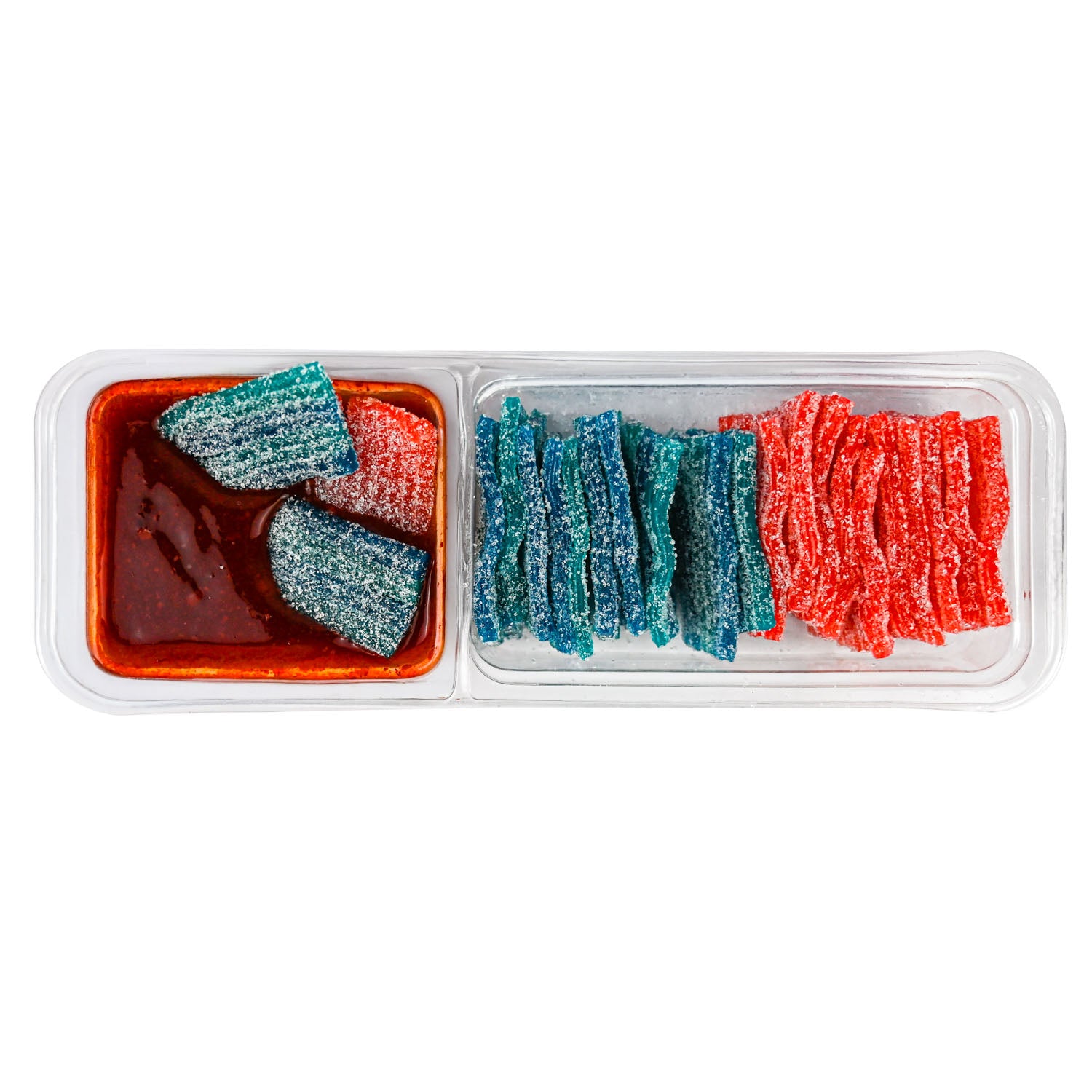 A clear plastic two-compartment candy container on a white background. The left compartment holds three sugar-coated sour gummy candies in red and blue.