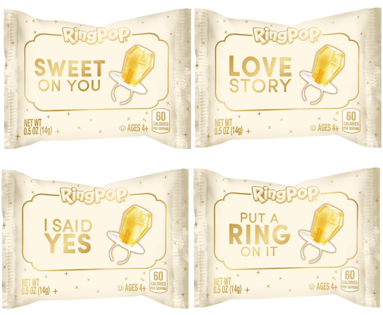 Four RingPop candy packages arranged in a 2x2 grid on a white background. The packages are cream-colored with gold lettering and illustrations, featuring the phrases 'Sweet on You', 'Love Story', 'I Said Yes', and 'Put a Ring on It'.