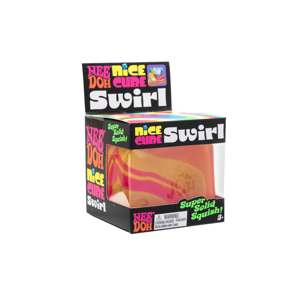 Boxed product labeled “Nee Doh Nice Cube Swirl” showing a large square squeeze toy with a pink and yellow swirl pattern visible through a clear window.