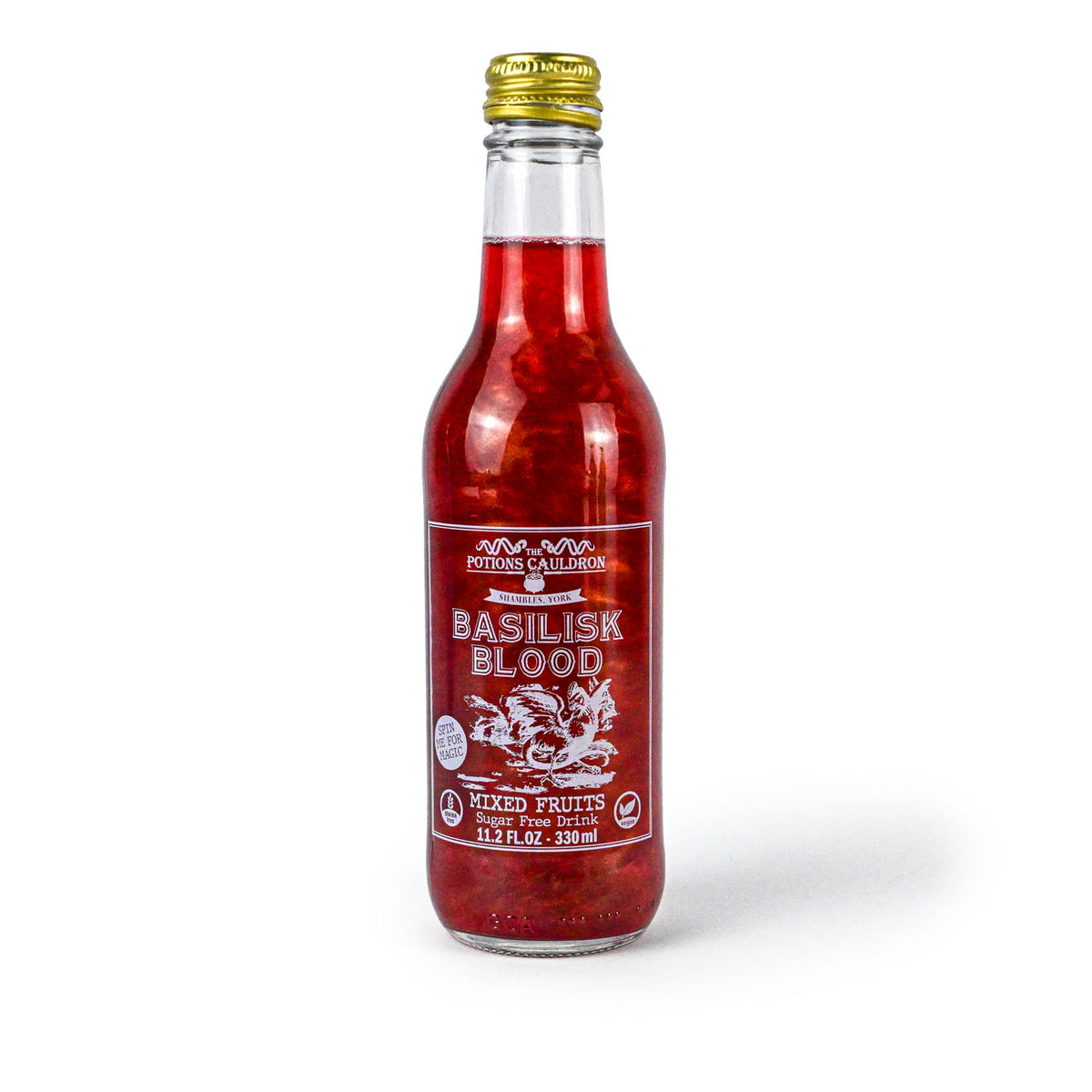 A clear glass bottle of Rottwein Galleries Basilisk Blood mixed fruit punch with a gold cap, filled with a vibrant red liquid and containing shimmer, set against a plain white background.
