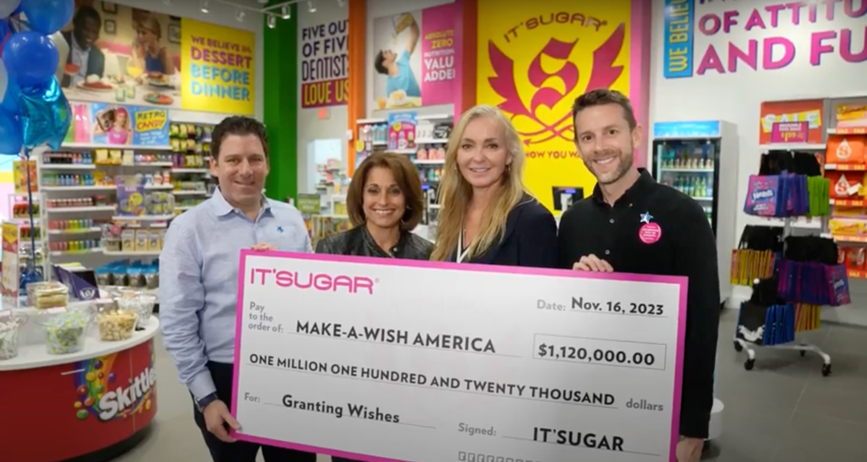 IT’SUGAR presents $1M check to Make A Wish America