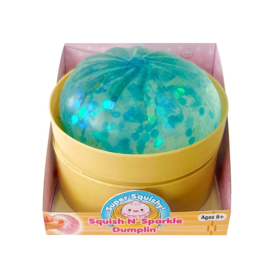 Tan Dumplin container with a blue sparkle dumplin inside