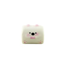 White Donkey Rolls squishy toy shaped like a rolled character with a simple face on a white background.