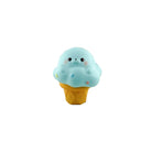 Blue seal ice cream cone–shaped squishy toy with a cartoon face on a white background.