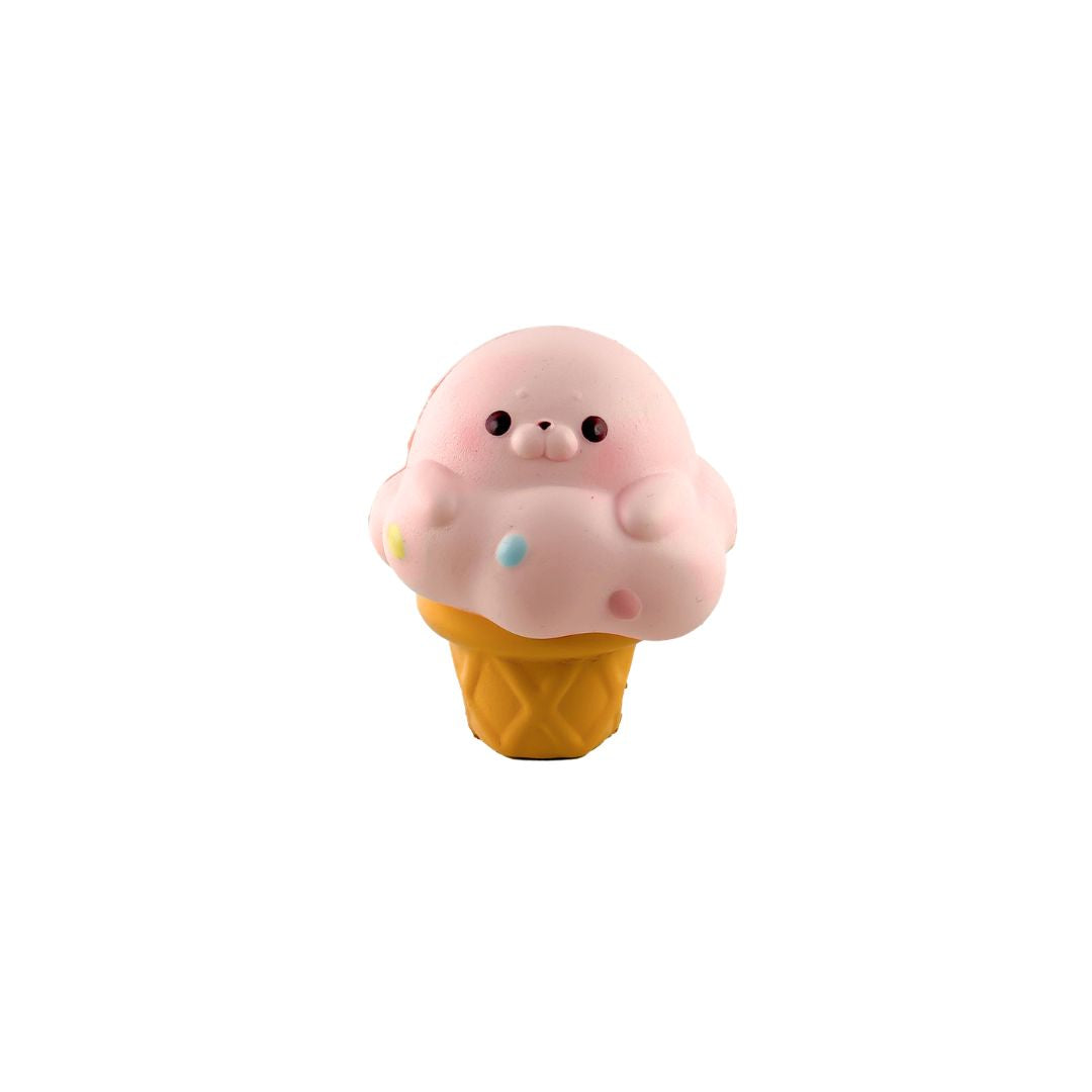 Pink seal ice cream cone–shaped squishy toy with a cartoon face on a white background.