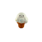 White seal ice cream cone–shaped squishy toy with a cartoon face on a white background.
