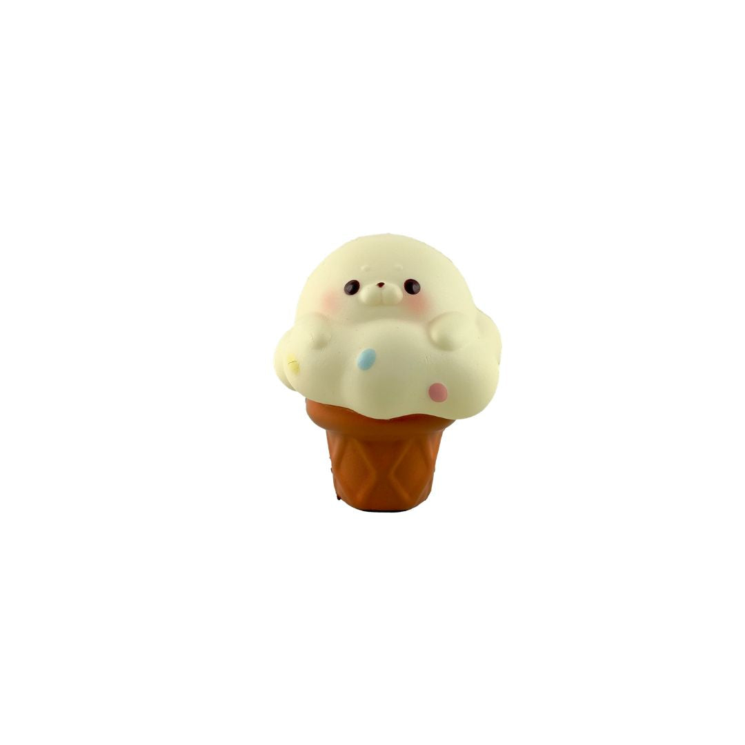 Yellow seal ice cream cone–shaped squishy toy with a cartoon face on a white background.