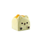 Side view of Doggy Toast–shaped squishy toy with a cube form, small ears, paw print details, and a cartoon face on a white background.