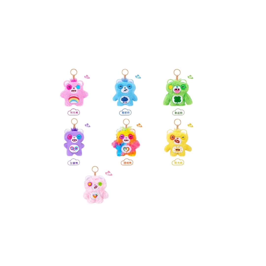 Eight colorful Care Bears plush bag charms displayed in a grid on a white background, each with a metal keyring and a different body color and belly emblem, including rainbow, heart, cloud, clover, and other symbols, with small decorative icons and labels next to each character.