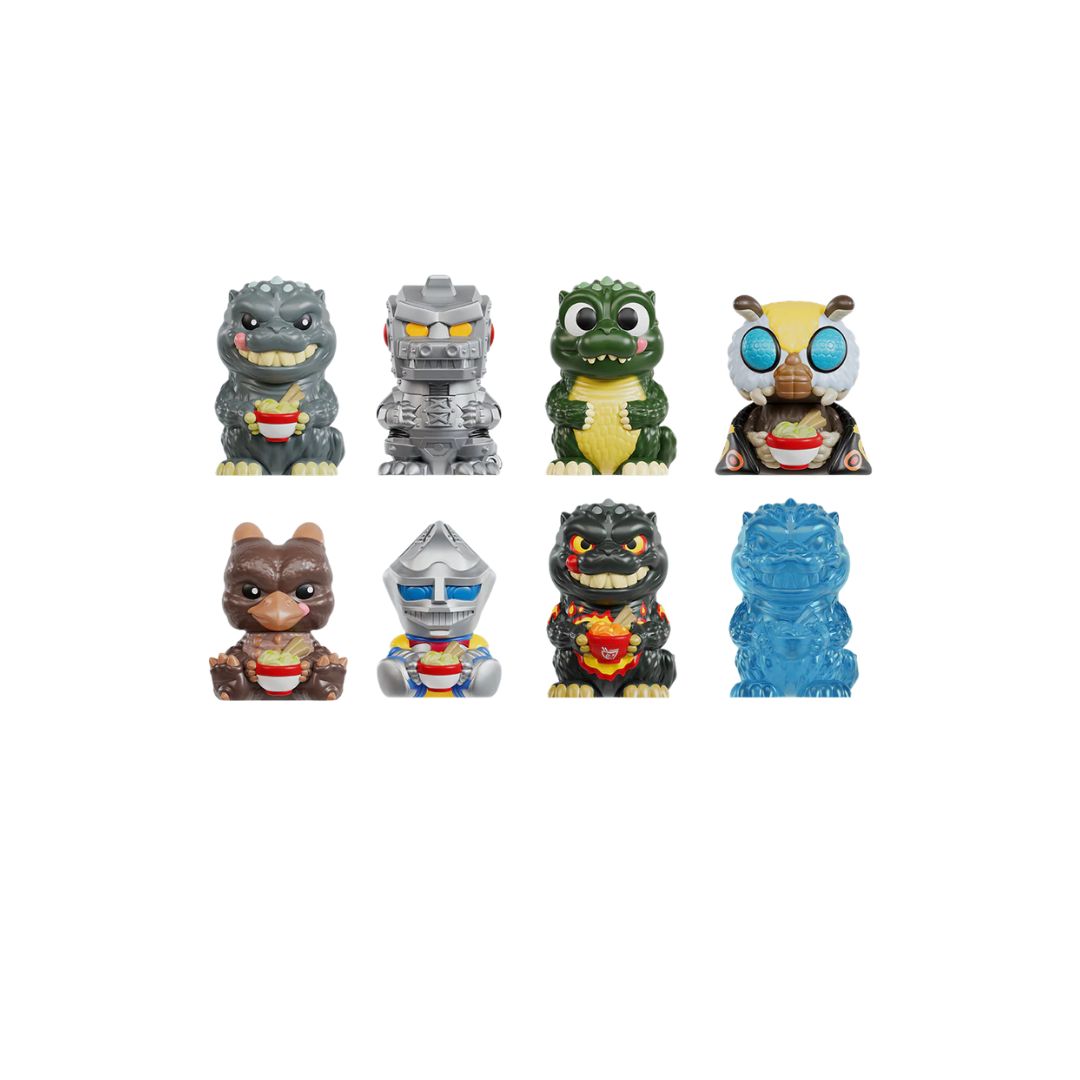 Eight small collectible figurines arranged in two rows, featuring monster, robot, animal, and insect‑themed characters on a white background.