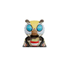 Insect‑style collectible figurine with large blue eyes holding a red bowl, centered on a white background
