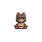 Brown animal‑style collectible figurine holding a red bowl, centered on a white background