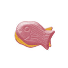 Pink fish‑shaped candy with a yellow filling visible between layers, shown on a white background