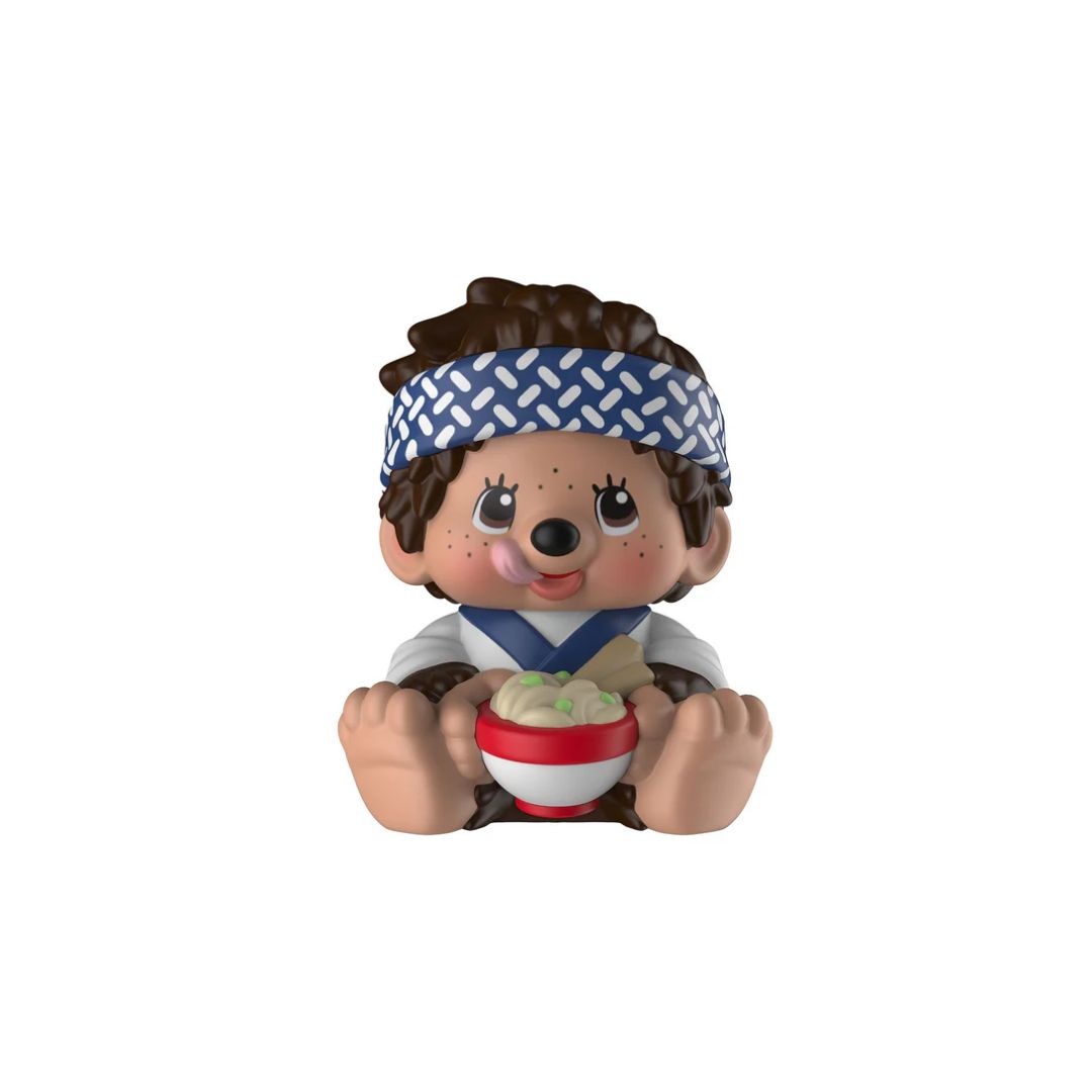 Toy figure of a character with a headband holding a bowl on a white background