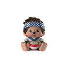Toy figure of a character with a headband holding a bowl on a white background