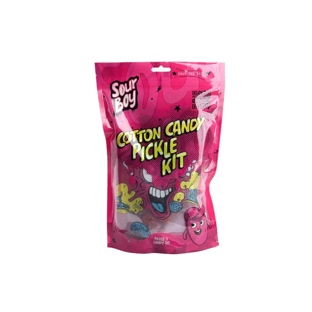 A pink “Sour Boy Cotton Candy Pickle Kit” package with bold graphics and cartoon illustrations, displayed on a white background.