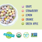 Colorful candy in a bowl with flavor options and certification logos on a light green background