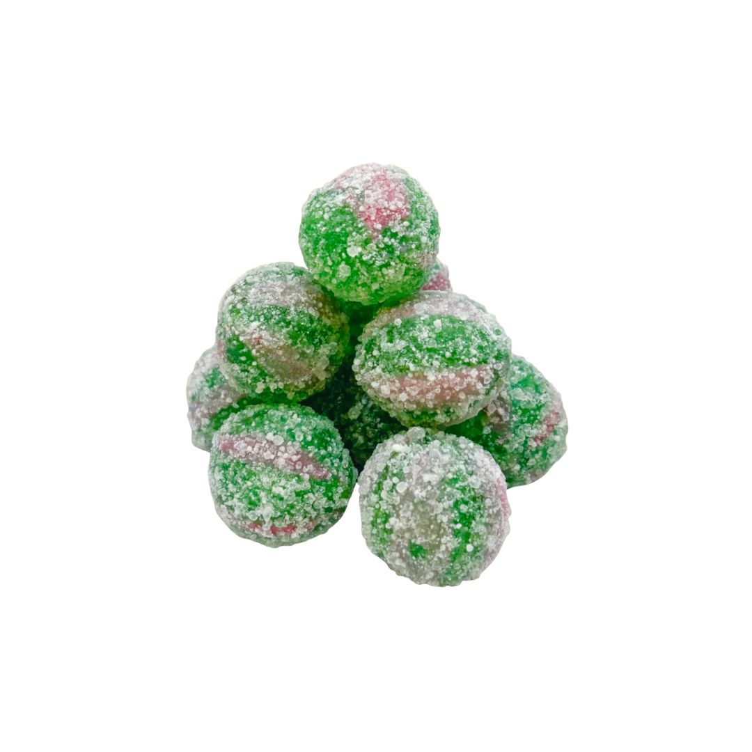 Green and pink sugared water melancholy sours on a white background