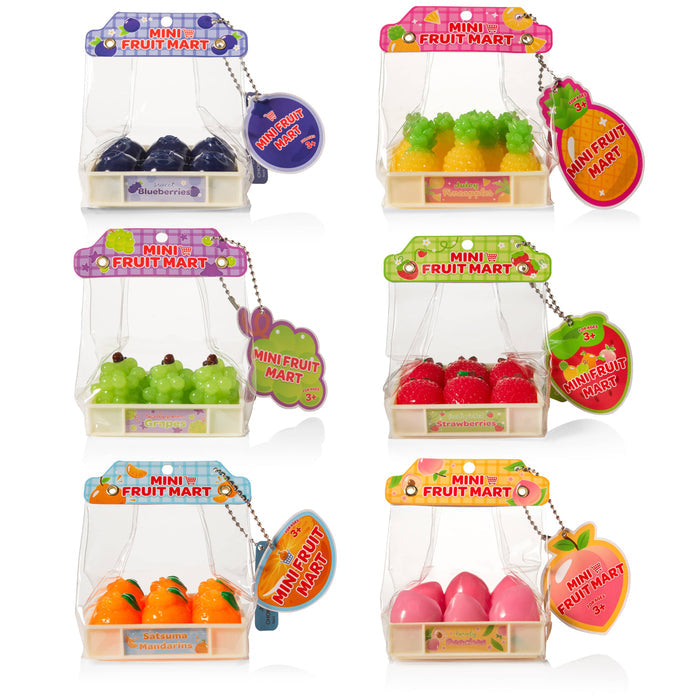 Miniature fruit mart packaging with various fruits on a white background