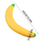 A yellow banana-shaped squishy toy on a white background with black dimension lines and text showing 40CM/15.8IN overall length and 7CM/2.