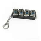 keyboard clicker keychain on white background