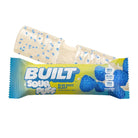 Sour Puff candy bar with blueberries on a white background