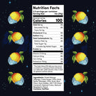 A stylized nutrition facts label centered on a dark starry background, surrounded by pixel-art mangoes. The label shows calories, nutrients, and ingredients text for dried mango flavor.