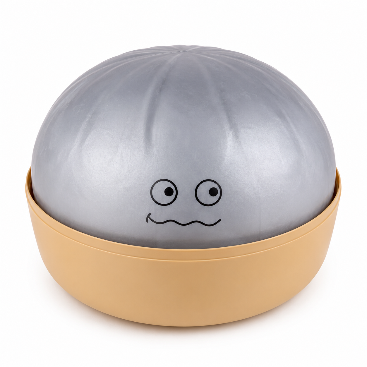 A novelty squishy dumpling toy shaped, featuring a metallic silver top half with a simple black face and a beige bottom half in a bowl-like base, shown on a white background.