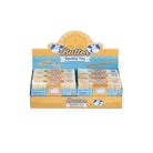 A retail display box of “Butter Squishy Toy” products designed like butter sticks, arranged in rows with farm-themed graphics and cow illustrations on the packaging.