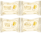 Four RingPop candy packages arranged in a 2x2 grid on a white background. The packages are cream-colored with gold lettering and illustrations, featuring the phrases 'Sweet on You', 'Love Story', 'I Said Yes', and 'Put a Ring on It'.