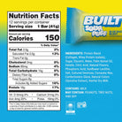 Nutrition facts label and package of Built Sour Puffs Blue Razz Blast on a gradient background