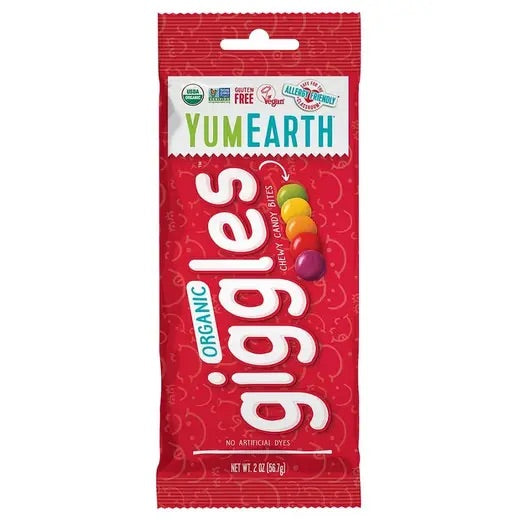 Red package of YumEarth Organic Giggles chewy candy bites on a white background