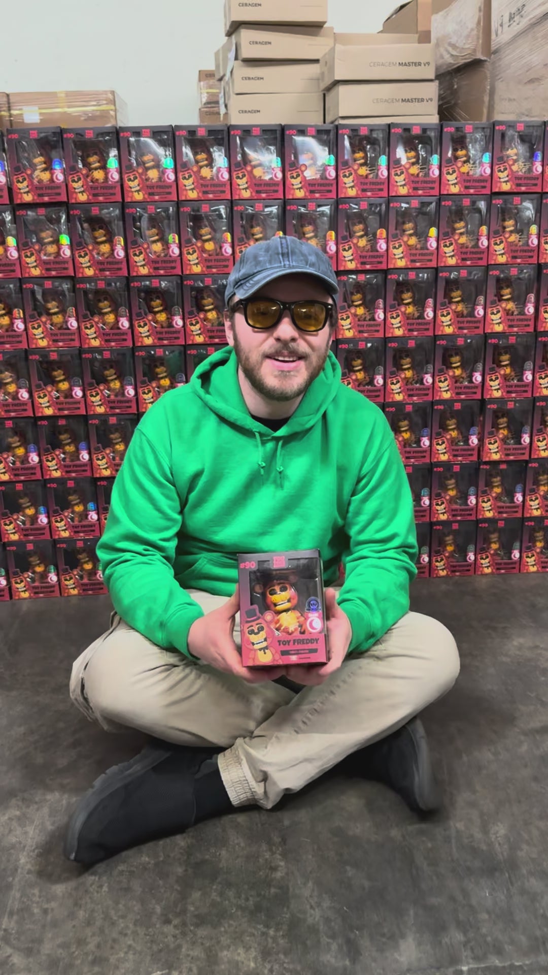 A Video of Kellen Goff, holding the toy freddy Vinyl collectible announcing the exclusive boxes
