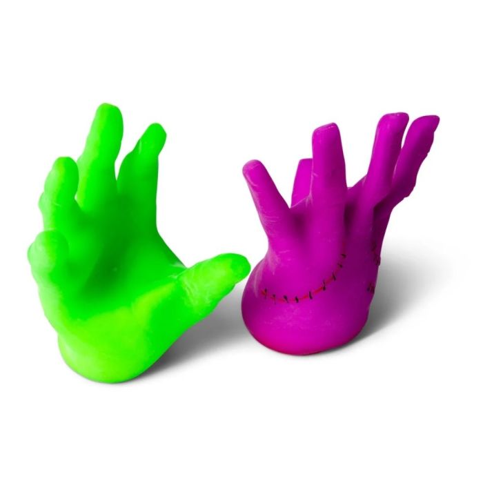 Green and purple monster hand-shaped stress relievers on a white background